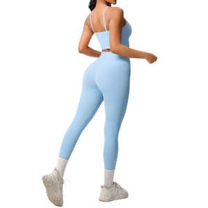 Light blue two-piece yoga set featuring slim strap sports bra and high waist leggings