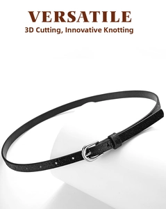 Detail view of black PU leather belt with snake-skin texture and silver needle buckle