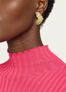 Detail of model wearing gold pleated leaf earrings in 18k gold-plated stainless steel