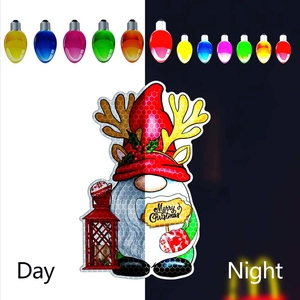 Detail of Christmas gnome and bulb stickers with day and night reflective effect