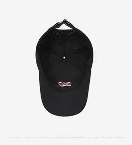 Detail view of breathable mesh lining and adjustable strap on black baseball cap