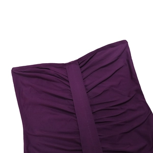 Detailed view of dark purple ruched fabric with vertical band design on dress