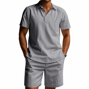 Detail of grey cotton linen polo shirt and shorts set with breathable fabric texture