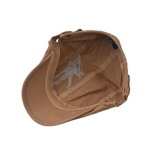 Detail view of cotton flat cap interior showing quality stitching and 100% cotton label