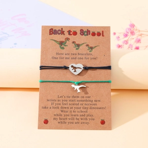 Detail of dinosaur heart bracelets for mother and daughter on Back to School card