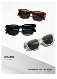 Close-up of square retro sunglasses in tortoiseshell black and ivory on a tiered display