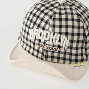 Kids gingham baseball cap with Brooklyn embroidery and soft cream brim for toddlers