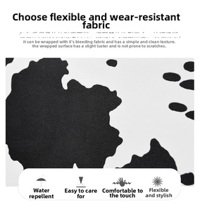 Detailed close-up of water-resistant cow print faux leather with a pebbled texture finish