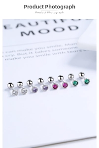 Detailed set of eight round zircon stud earrings in various colors with screw back design