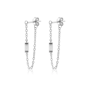 Macro view of S925 silver chain earrings featuring emerald-cut cubic zirconia stones