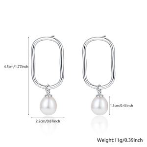 Detail view of 925 silver long drop earrings with white pearls and size dimensions