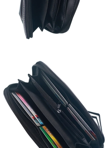 Interior view of black vintage skull long wallet with multiple card slots and zipper pocket