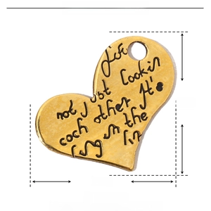 Detailed size chart of a 17mm gold heart pendant made of stainless steel and enamel