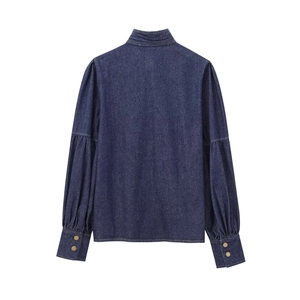 Deep blue denim long sleeve shirt with puff sleeves and tie bow back detail
