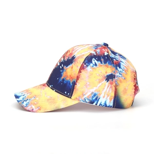 Detailed view of the vibrant tie-dye pattern on this tropical cotton baseball cap