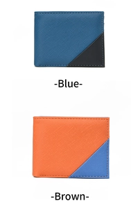 Detail view of bi-color men wallets in blue-black and orange-blue cross-grain leather