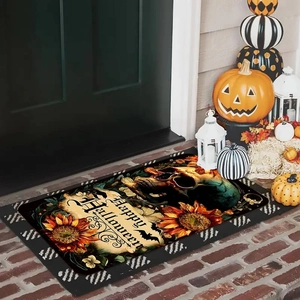 Detail of Halloween diatomaceous mat with skull pattern on porch near pumpkins