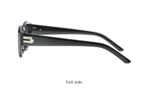Macro side view of black sunglasses featuring wide temples and silver U-shaped metal detail