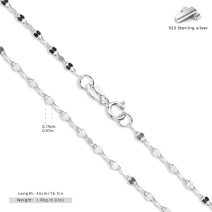 Macro shot of 925 sterling silver chain featuring the S925 hallmark and lobster clasp