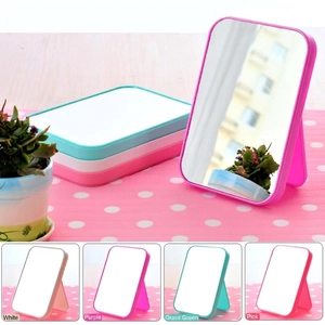 Portable folding makeup mirror in four colors with adjustable desktop stand design