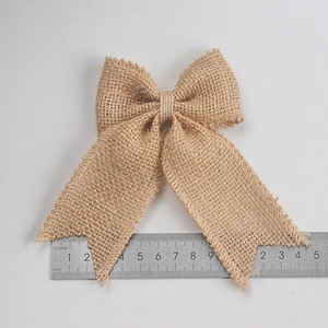 Natural jute burlap bow for DIY crafts with frayed edges and rustic texture 9cm size