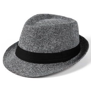 Close-up of the grey woven tweed texture and black ribbon band on a classic fedora hat
