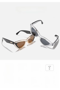 Detailed cat-eye sunglasses featuring dual-tone frames and functional UV400 icons