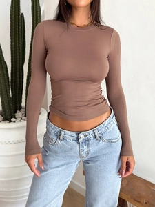 Detail of slim fit brown long sleeve Y2K top featuring a classic round neck and soft fabric