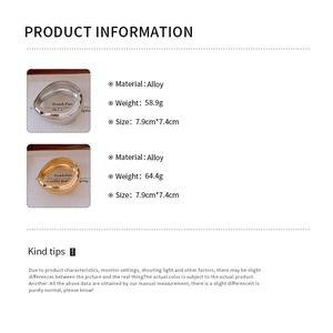 Detail showing irregular wide minimalist alloy cuff bracelets in gold and silver finish