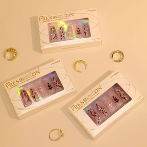 Press-on nails featuring Chinese dragon patterns and silver crosses in elegant box