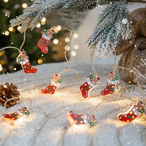 Christmas LED light string with warm white bear stockings for festive tree decoration