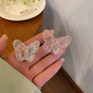 Charming iridescent butterfly hair clips in pink and clear for girls' hairstyling