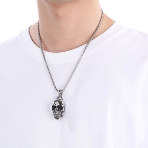 Gothic skull pendant necklace for men in stainless steel displayed on a model