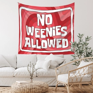 Detail view of red bohemian tapestry with No Weenies Allowed text on a white wall