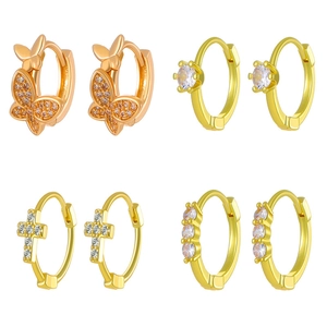 Cross and butterfly dangle huggie earrings set with zircon stones in gold finish