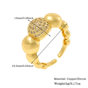 Detail view of adjustable gold ring with zircon sphere and size dimensions displayed
