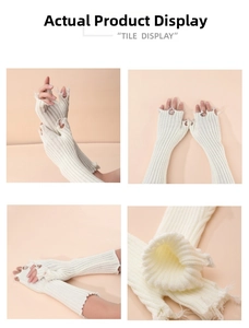 Detail of white distressed knit fingerless arm warmers with trendy ripped design