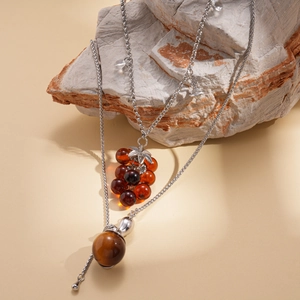 Vintage silver chain necklace with amber resin grape clusters and geometric stone pendants