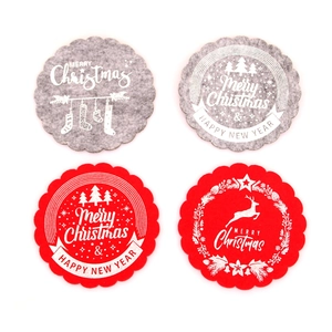 Set of 4 Christmas felt coasters in red and grey with Merry Christmas scalloped edges