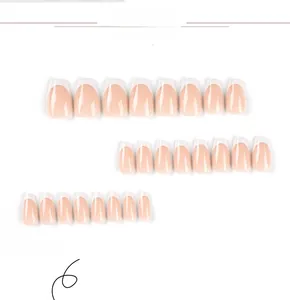 Detail view of 24 pieces french tip press-on nails in nude pink ballerina shape