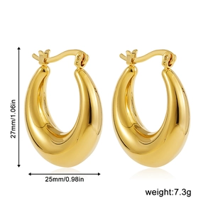 Detail view of 18K gold chunky hoop earrings with 27mm height and 25mm width dimensions