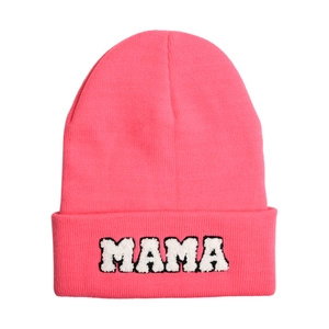 Detailed view of hot pink ribbed knit beanie with white fuzzy MAMA 3D embroidery