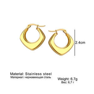 Detailed close-up of 2.4cm gold stainless steel irregular C-shape earrings