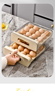 Detail of cream-colored double-layer drawer egg storage box with transparent shell