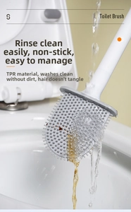 Detailed view of the TPR silicone toilet brush head being rinsed under running water