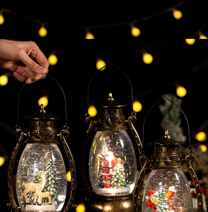 Macro view of Christmas lanterns with Santa, Snowman and Reindeer in snow globe scene