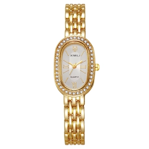 Montre quartz dorée élégante avec boîtier ovale serti de strass et bracelet à 5 maillons