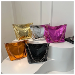 Detailed view of bucket bags in five metallic colors with elegant chain straps