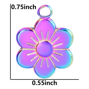 Detailed view of flower pendant in iridescent vacuum-plated 18k gold steel with measurements