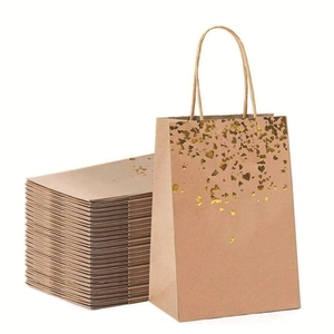 Brown kraft paper gift bags with gold foil hearts and twisted rope handles for parties